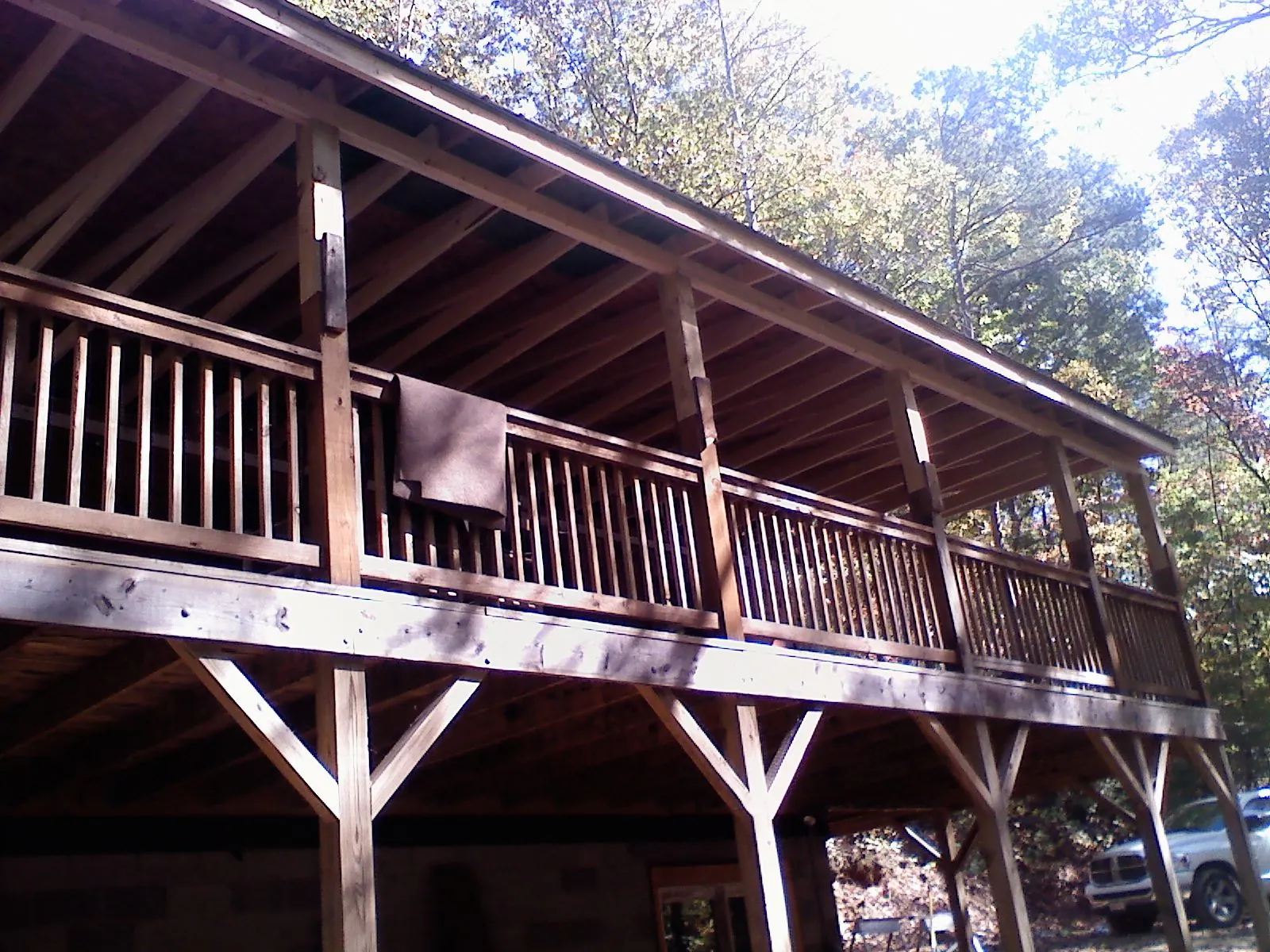 Timber framing under a new elevated porch and deck — Roof Leak Repair in Marbury by Roofing Brothers